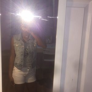 PRICES:NEGOTIABLE.Cute jean jacket w/o sleeves.